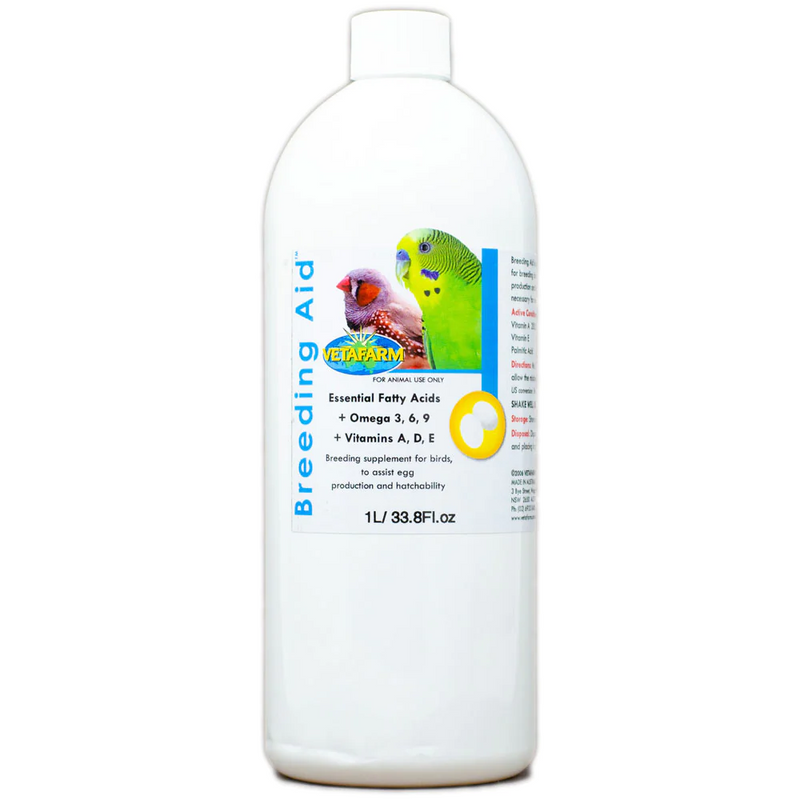 Bottle of Breeding Aid supplement for birds on a white background